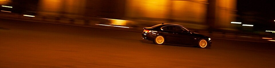 Car on the road in dark night
