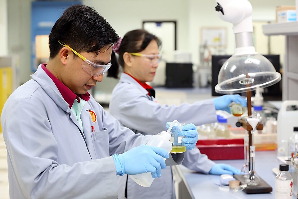 Lab technicians working in the Production Chemistry Lab